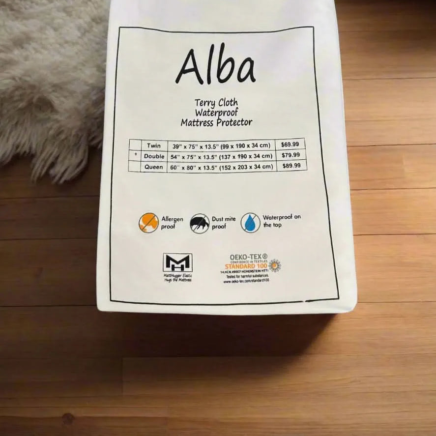 White Alba Terry Cloth Waterproof Mattress Protector in packaging, showing sizes and features.